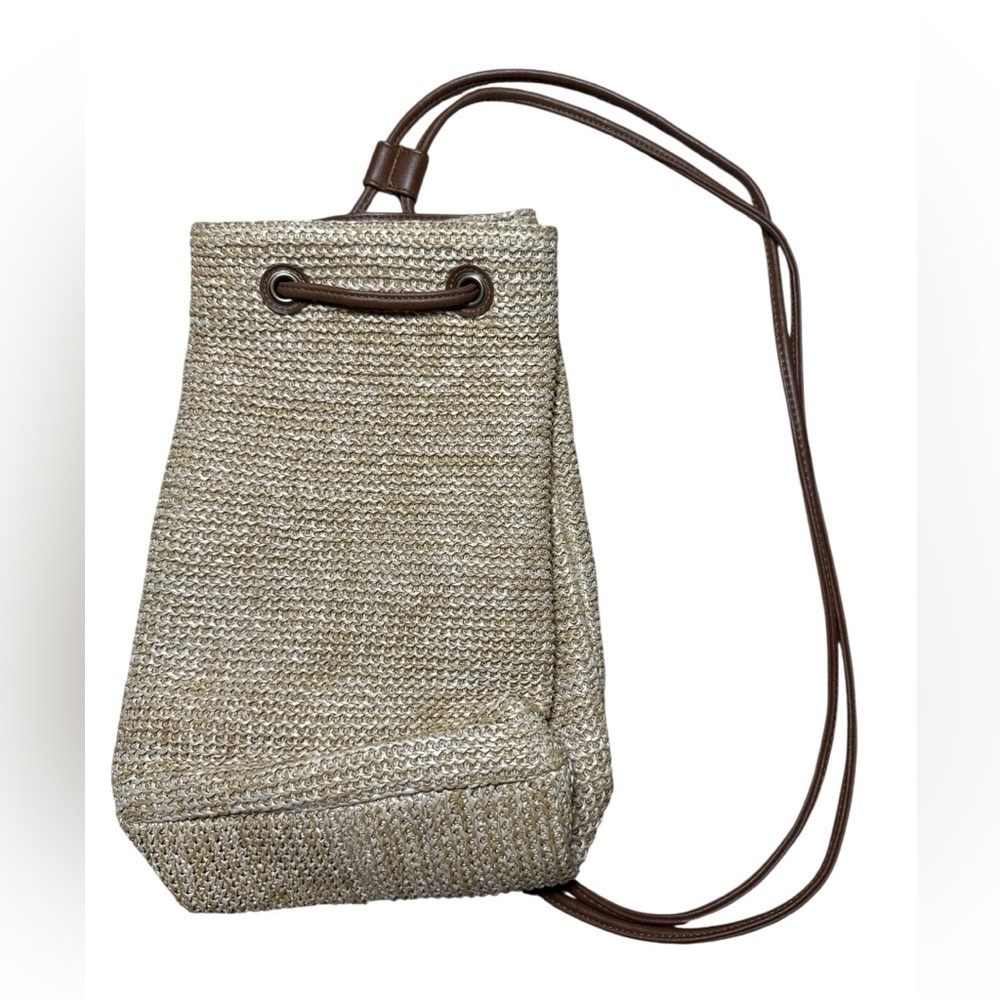 Woven Straw Drawstring Backpack With Brown Trim - image 1